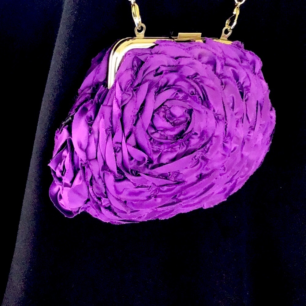Purple clutch bag